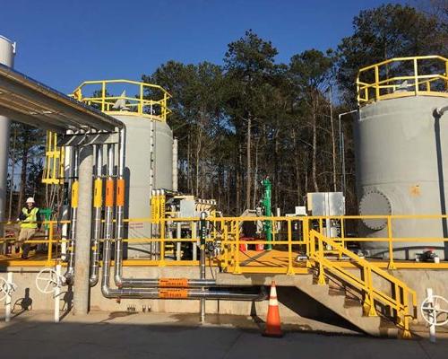 Exterior photo of Greenfield Biologics Facility process tanks and piping